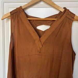 Copper V-neck sleeveless blouse with ruffle detailing